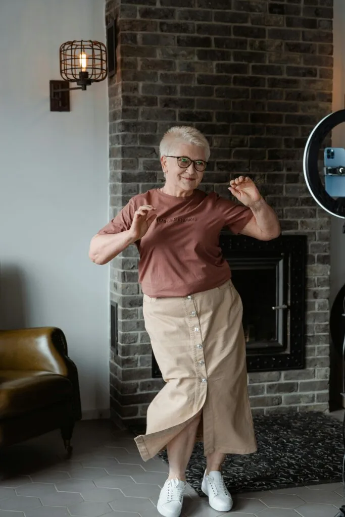 Woman dancing because she save for retirement